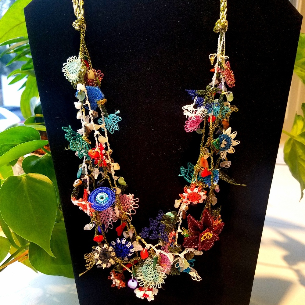 Uniquely hand-knitted needle lace necklace